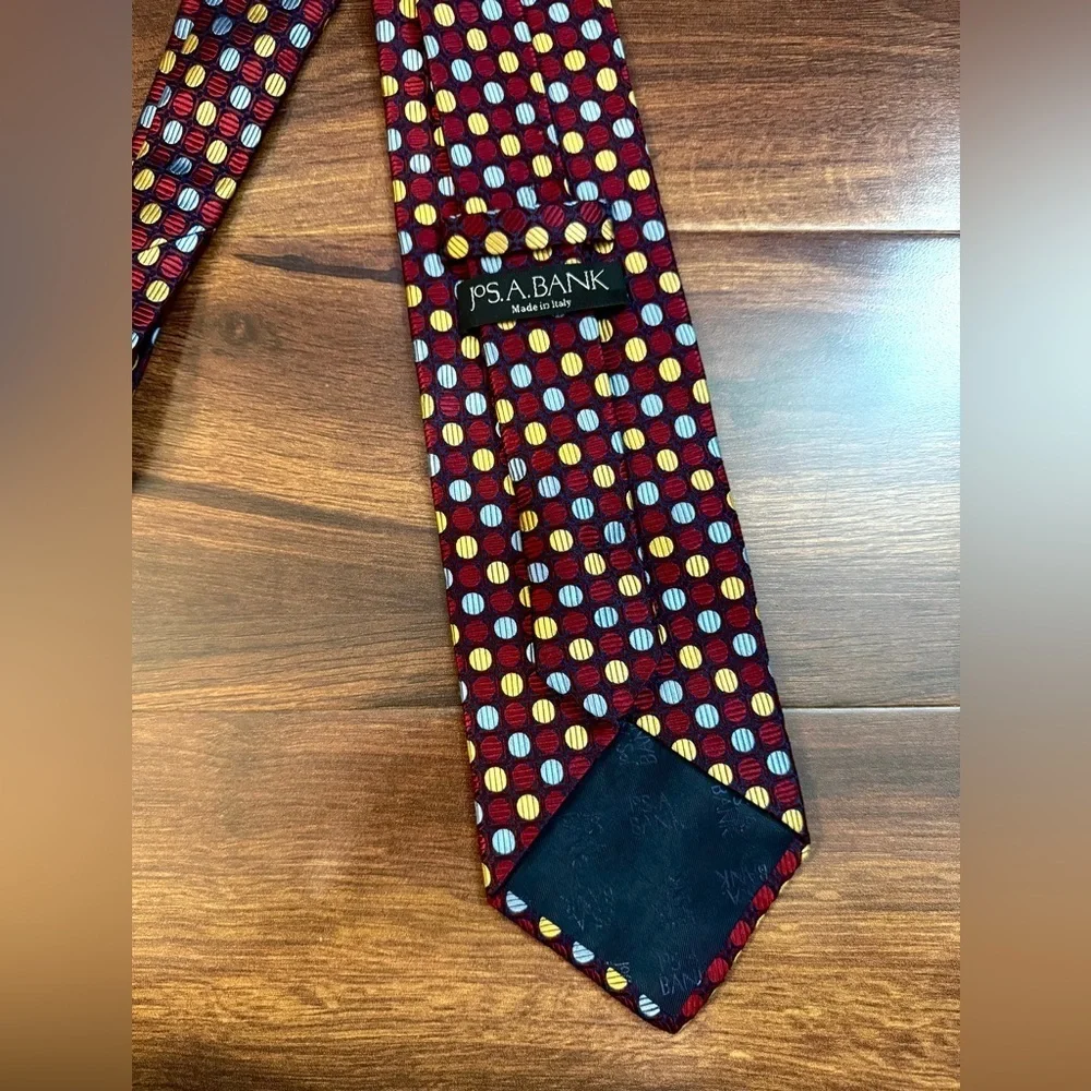 JOS. A BANK Burgundy and Gold Geometric Patterned Silk Tie Made In Italy